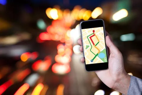 Hand of man using map on smartphone application with bokeh background of car  Stock Photos