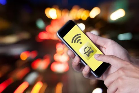 Hand of man using smartphone call taxi by application smartphone and wifi net Stock Photos
