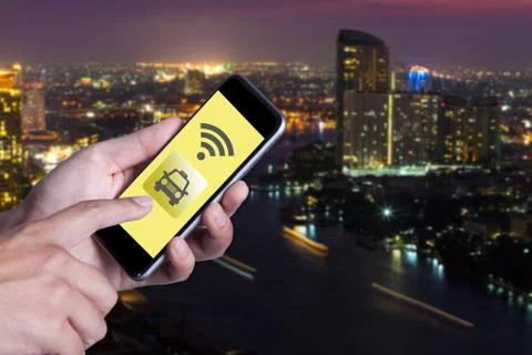 Hand of man using smartphone call taxi by application smartphone and wifi net Stock Photos