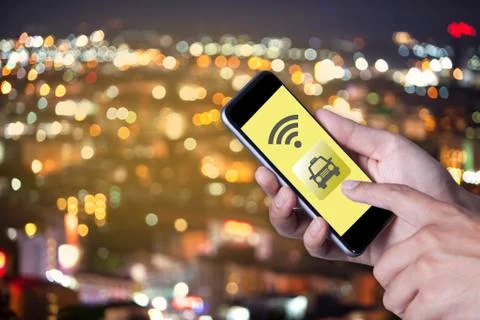 Hand of man using smartphone call taxi by application smartphone and wifi net Stock Photos