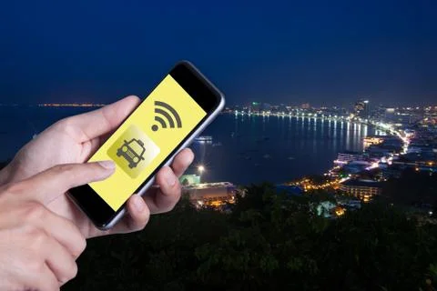 Hand of man using smartphone call taxi by application smartphone and wifi net Stock Photos