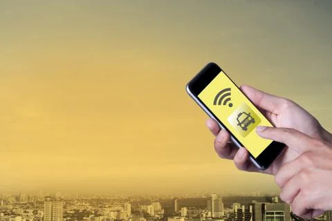 Hand of man using smartphone call taxi by application smartphone and wifi net Stock Photos