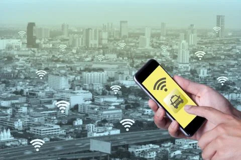 Hand of man using smartphone call taxi by application smartphone and wifi net Stock Photos