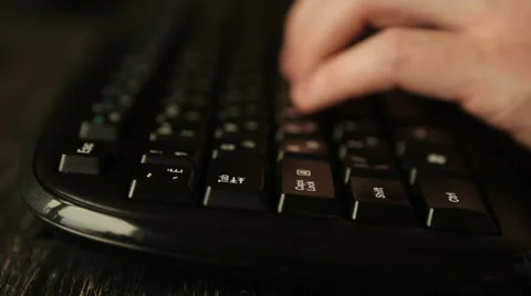 Hand of man working at computer typing on keyboard 스톡 동영상 62133933