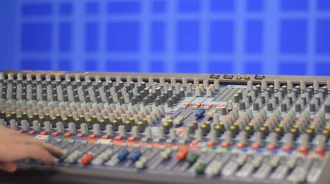 Hand manipulates mixing console Stock Footage 39740421