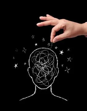 A hand manipulates a thread from a drawn head with confused thoughts and st.. Stock Photos