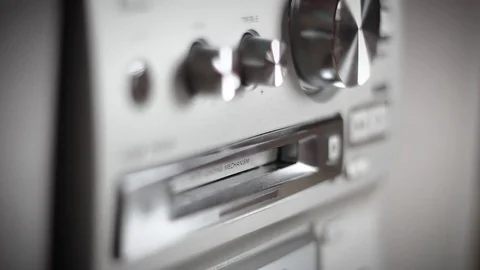 Hand manually loading minidisc in minidisc player Stock Footage 84878619