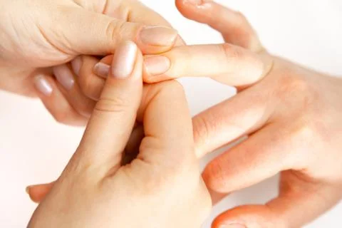 Hand massage Stock Photos
