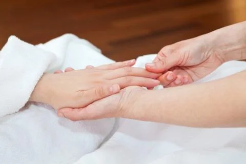Hand massage Stock Photos