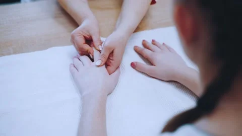 Hand massage on the table 스톡 동영상 151846899