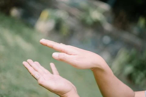 A hand measuring an object with precision, showcasing attention to detail a.. Stock Photos