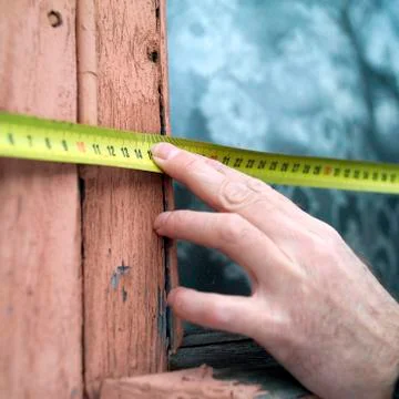 Hand measuring window 库存照片