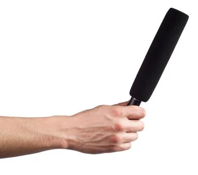 Hand with a microphone Stock Photos