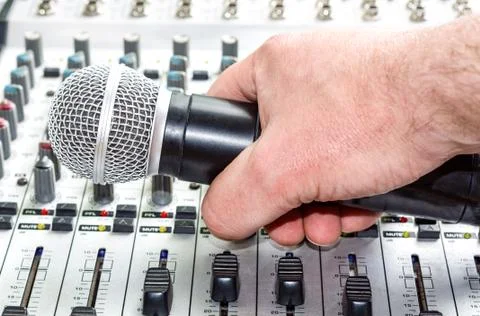 Hand with microphone Foto stock