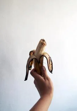 In the hand is a missing banana Fotos de archivo