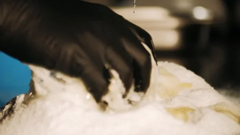 Hand mixing salt with egg Stock Footage 125458426