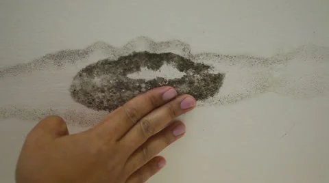 Hand with mold of water damaged ceiling Video stock 34261599