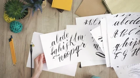 Hand with Motivation Phrases Is Looking for Beautiful Calligraphy Stock Footage 148692011