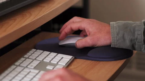 Hand on mouse and keyboard Stock Footage 50204952