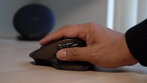 Hand on mouse clicking and scrolling 2 Stock Footage 102509745