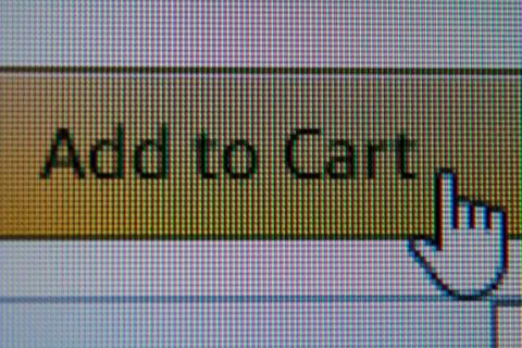 Hand mouse cursor on Add To Cart Button Stock Photos