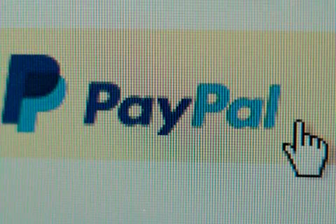 Hand mouse cursor on Paypal Button Stock Photos