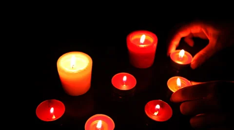 Hand Moved Candles On Table CloseUp Vídeo Stock 30139586