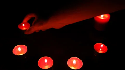 Hand Moved Candles On Table In Semicircle Video stock 30139650