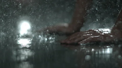 Hand movement in rain Stock Footage 47563118