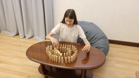 A hand moves a chess piece during a game, capturing an opponent's piece Stock Footage 278886166
