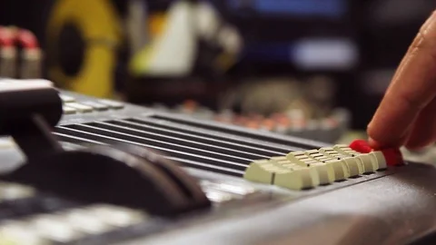 Hand moves the faders 스톡 동영상 107116658