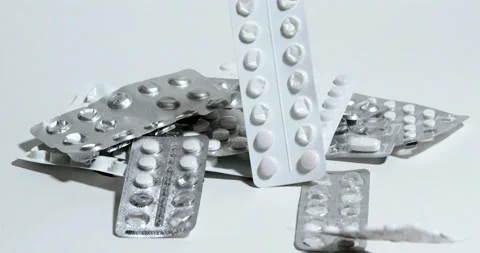 Hand moves to medication holders Stock Footage 197337917