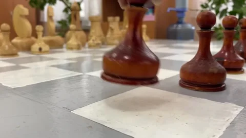 Hand moves a pawn on a chessboard Video stock 171292200