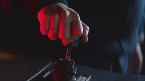 Hand moves shiny levers and presses glowing buttons Видео 321773820