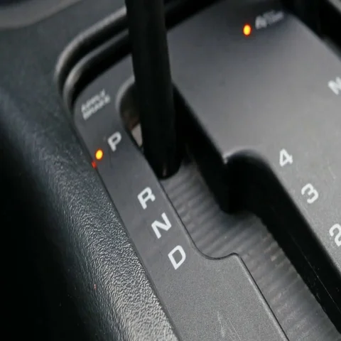 Hand moving automatic transmission into drive mode Stock Footage 69488491