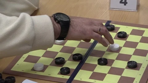 Hand moving checkers piece Stock-Footage 332807652