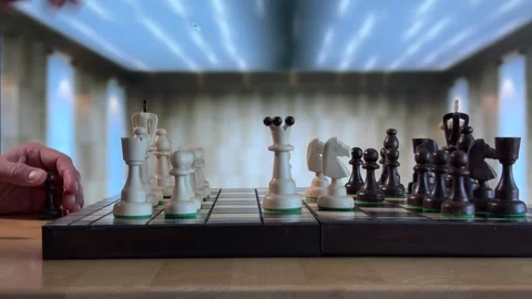 Hand Moving Piece in Friendly Chess Match Stock Footage 310139186