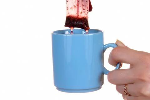 Hand with mug Stock Photos