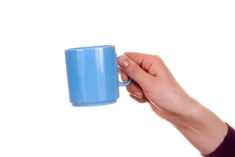 Hand with mug Stock Photos