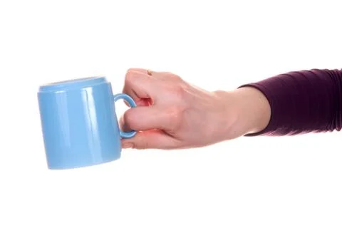 Hand with mug Stock Photos
