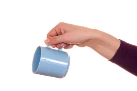 Hand with mug Stock Photos