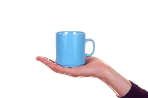 Hand with mug Stock Photos