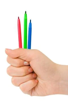 Hand with multicolored pens Stock Photos