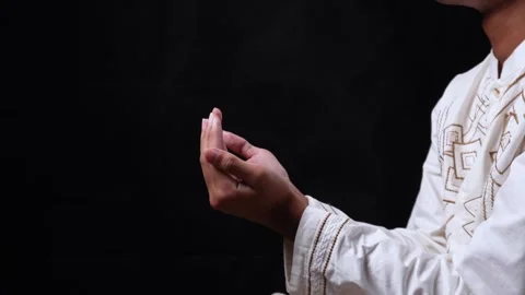 Hand of Muslim Man Doing Praying With Isolated Black Background Stock Footage 267933992