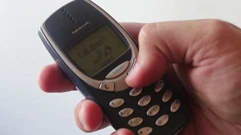 Hand Is Navigating Through Menu Of An Obsolete Nokia Mobile Phone Stock Footage 158317931
