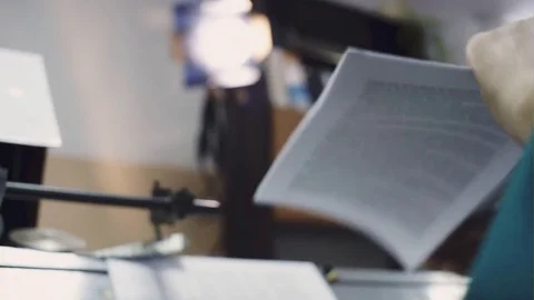 Hand near the old machine that sews books printing Vídeo Stock 74828352