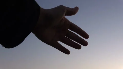 Hand with nightime background Stock Footage 139008030