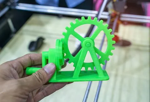 Hand with Object printed on 3d printer close-up Stock Photos