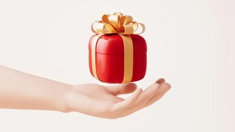 Hand offering floating red gift box with golden ribbon and bow, celebration.. Stock Footage 332391682