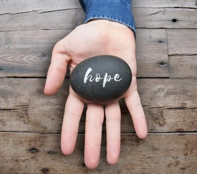 Hand offering hope Stock Photos
